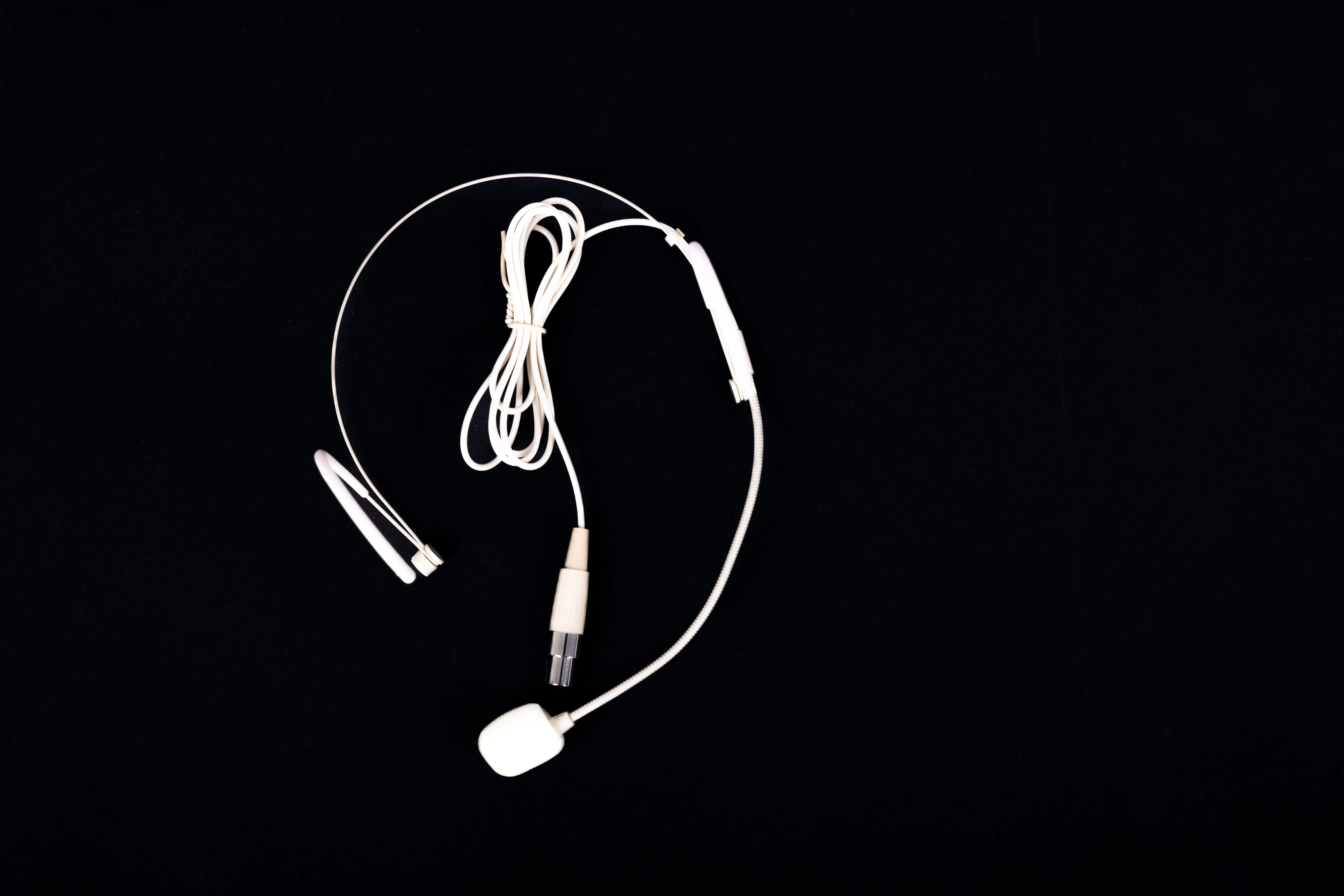 Professional metal receiver unit with LCD display showing frequency and battery indicators