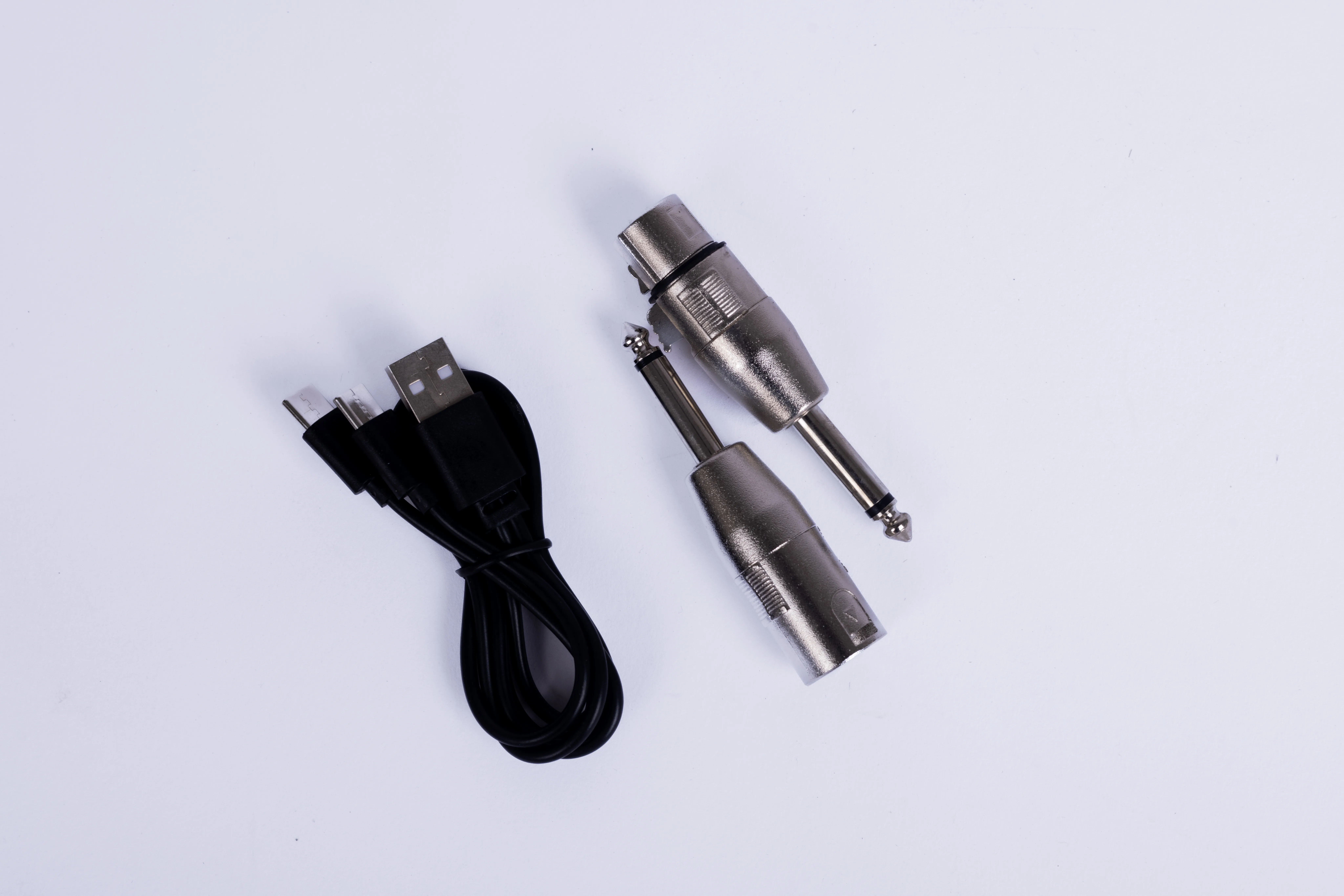 Close-up of professional connectors including XLR, 6.35mm and 3.5mm inputs